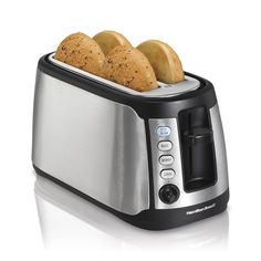 two pieces of bread in a toaster on a white background