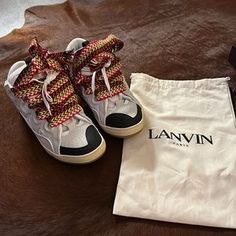 Lanvin | Shoes | Lanvin Curb Suede Trim Sneakers | Poshmark Luxury Leather Custom Adidas Sneakers, Lanvin Beige Sneakers, Luxury Custom Adidas Sneakers With White Sole, Larvin Shoes, Lavins Shoes Store, Lavin Shoes, Lanvin Sneakers Outfit, Lanvin Slides, Lanvin Outfit