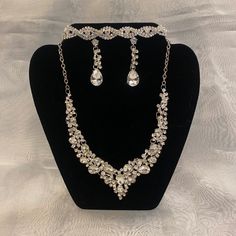 This Necklace Set Features Aa Silver Tone With Clear Sparkling Jewels. Comes With The Necklace, Matching Earrings, And Bracelet. Jeweled Necklace, Necklace Matching, Ear Ring, Ankle Chain, Jewel Necklace, The Necklace, Silver Jewels, Neck Lace, Ring Bracelet