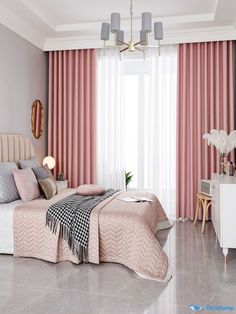 a bedroom with pink curtains and white furniture