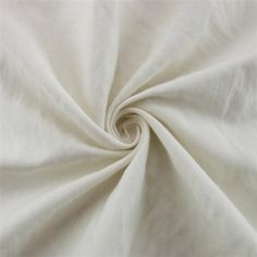 a white fabric is shown in close up