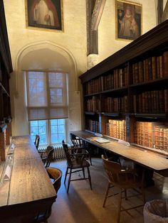 an old library with many books on the shelves