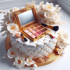 there is a cake with flowers and makeup on it that has a mirror in the middle