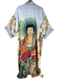 We Are Delighted to Announce the Launch of Our New Kimono Design. Pre-Order is Now Open, You'll Enjoy 25% Off and a Free Secret Bonus, This Is a Limited Time Offer Only.  Gorgeous kimono robe, designed with a lightweight fabric, it flows as you move for a comfortable wear. It features beautiful artwork of Buddha meditating on a lotus flower, in his enlightenment state. The kimono is hand-tailored by skilled master, ensuring impeccable craftsmanship and attention to detail. The sloper pattern, ca Haori Aesthetic, Sloper Pattern, Belt Kimono, Japanese Clothing, Kimono Design, Japanese Dress, Kimono Fabric, Aesthetic Clothing, Pajama Robe