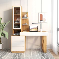 a white desk with a book shelf and laptop on it next to a potted plant