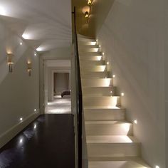 the stairs are lit up with white lights