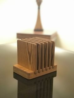 a small wooden object sitting on top of a table