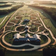 an aerial view of a large building surrounded by trees