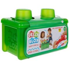 a green plastic box with two children's toys in it