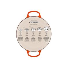 an orange frying pan with instructions on the bottom and side, in front of a white background