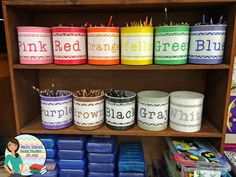 there are many different colored jars on the shelf with pencils and markers in them