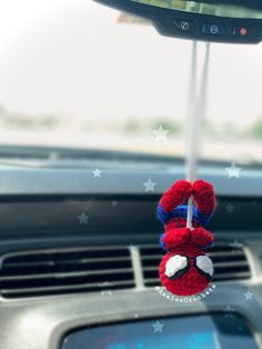 This is a meticulously handcrafted crocheted Spider-Man car hang. Each stitch reflects the passion and precision that makes every piece unique-a perfect blend of artistry and fandom that adds a touch of superhero flair to your car interior. Car Mirror Hangers For Men, Spider Man Crochet For Car, Spider Man Crochet Projects, Crochet Projects To Make For Boyfriend, Spider Man Car Decor, Crochet Car Amigurumi, Amigurumi Car Hanging, Hanging Spider-man Crochet, Crochet Hanging Spiderman Pattern