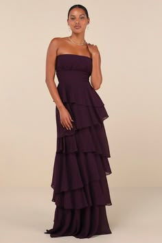 Your charm and the Lulus Gorgeous Essence Dark Purple Strapless Tiered Maxi Dress will make a flawless duo that'll keep everyone impressed all night long! Strut through the evening in effortless elegance with this lightweight woven chiffon gown that features a strapless, lightly gathered bodice (with hidden no-slip strips) and a sleek straight neckline. The high, banded waist sits atop a tiered, A-line skirt that falls to a sweeping maxi hem. Hidden back zipper/clasp. Dark Gown Elegant, Plum And Green Bridesmaid Dresses, Dark Purple Dress Formal Evening Gowns, Lulus Purple Dress, Long Winter Dresses Formal, Bridesmaid Dresses Big Bust, Hourglass Bridesmaid Dress, Winter Wedding Maid Of Honor Dresses, Deep Purple Prom Dress Long