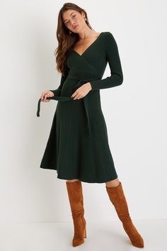 The Lulus Warm Emotions Emerald Green Skater Midi Sweater Dress is winter 'fit that is sure to give everyone fuzzy feelings! Soft and stretchy ribbed knit shapes this sophisticated dress that has long fitted sleeves that frame a flattering surplice bodice. Removable sash tie punctuates the fitted waist that sits atop a flared skater skirt (with a contrasting knit pattern) that falls to a twirl-worthy midi hem. Fit: This garment fits true to size. Length: Mid-calf length. Size small measures 42" Flared Skater Skirt, Winter Wedding Guest Dress, Green Sweater Dress, Midi Sweater Dress, Christmas Dress Women, Fancy Frocks, Green Velvet Dress, Winter Dress Outfits, Dresses Casual Winter