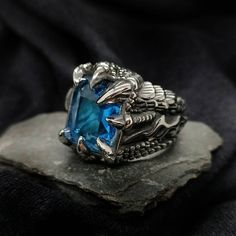 Blue Claw Ring 100% Stainless steel  Waterproof, Tarnish free, No rusting or green marks. Fast Shipping International postage available  Thank you for checking out my shop, be sure to take a look at our other items if you like this one. Find Sooki on Instagram @sookicollective Rings Gothic, Grunge Jewelry, Antique Silver Rings, Claw Ring, Dragon Claw, Mens Rings, Signet Rings, Ring Mens, Unusual Jewelry