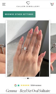 a woman's hand is shown with two rings on it and the other has a diamond