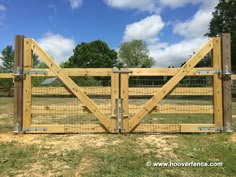 Snug Cottage Hardware Throw Over Gate Loop Latches for Wood Gates | Hoover Fence Co. Diy Double Gate Fence, Round Post Fence, Diy Wood Fence Cheap, Farmhouse Gate Entrance, Wood Gate Latch Ideas, Farm Fences And Gates Country Life, Wooden Gate Latch Ideas, Rustic Gates Entrance Wood, Double Wooden Gates