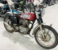 several motorcycles are lined up in a row