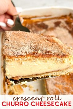 a piece of cheesecake being lifted from a casserole dish