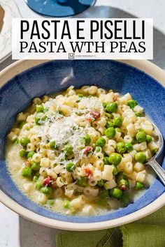 pasta with peas and parmesan cheese in a blue bowl