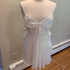 White Chiffon And Lace Night Gown With Satin Bows In Side And Matching Satin Bottoms. Never Worn. Excellent Condition. True To Size Large. Measurements: Side Seam To Side Seam: 15 Inches Shoulders To Hem: 31 Inches Coquette Night Dress, White Sheer Nightgown, White Coquette Nightgown For Wedding Night, Sheer Sleepwear For Wedding Night, White Sheer Sleep Chemise, White V-neck Coquette Sleepwear, White Sheer Chemise For Sleep, White Coquette Nightgown For Sleep, Sheer White Sleepwear