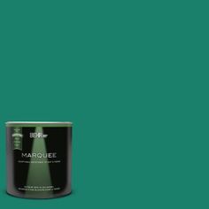 a can of marquee paint on a green background