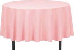 a round table with a pink cloth on it