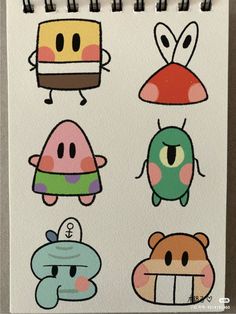 a drawing of different types of cartoon characters on a sheet of paper with marker pens