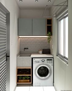 a washer and dryer in a small room