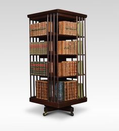 an old bookcase with many books in it