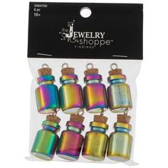 twelve rainbow colored glass bottle charms with corks in the front and back of each pack