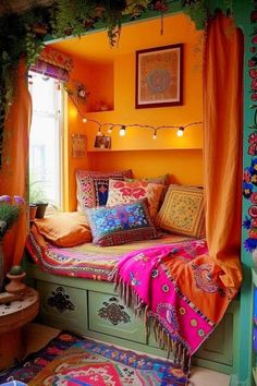 an orange bedroom with colorful pillows and blankets on the bed