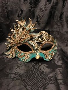 Venetian Mask Masquerade for Men or for Women - Traditional and original papier-mache Venetian mask, handmade and decorated with acrylics colors and glitter All our masks are handmade papier-machè masks made in Venice in our Atelier Our decorators use techniques typical of the Venetian tradition such as stucco, acrylics and glitter. This Venice mask shape is available in different colors and it's considered as a very original one. We ship Worldwilde with DHL & FedEx. Only door-to-door shipme Artistic Masquerade Mask For Costume Party, Artistic Masquerade Mask For Mardi Gras, Artistic Masquerade Mask For Carnival Festivals, Artistic Masquerade Mask For Mardi Gras Carnival, Artistic Masquerade Mask For Carnival, Green Masks For Mardi Gras Carnival, Artistic Multicolor Masquerade Mask For Carnival, Green Mask For Masquerade Carnival, Artistic Multicolor Masquerade Mask For Mardi Gras