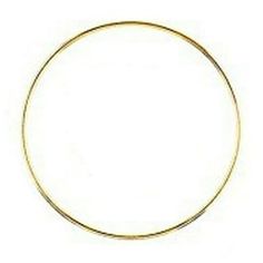 a gold colored metal ring on a white background