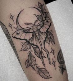 a woman's leg with a tattoo on it