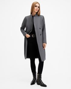 Keep it classic in the Sidney Coat. Made from a luxurious Italian cashmere wool-blend fabric and fitted to a timeless single-breasted silhouette. The stand collar defines the iconic, sophisticated shape – it's the perfect addition to your cold-weather wardrobe.  This coat is designed to a regular fit that is true to size Button closure Long sleeves Stand collar Knee length Single breasted Italian wool Two pockets One interior pocket Recycled fabrics Italian cloth – woven in Prato, Italy. Classic Wool Coat For Office With Concealed Fastening, Classic Wool Coat With Concealed Front Fastening, Classic Wool Coat With Concealed Fastening For Office, Classic Wool Coat With Concealed Placket, Chic Wool Coat With Concealed Placket For Work, Classic Structured Outerwear For Career, Elegant Tailored Long Wool Coat, Elegant Double-breasted Wool Coat For Business, Modern Blazer With Stand Collar For Workwear