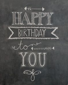 a chalkboard with the words happy birthday to you written on it and an arrow