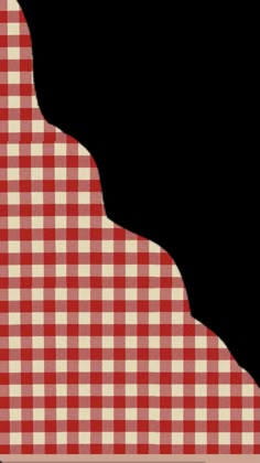 a red and white checkered table cloth with an arrow pointing up to the right