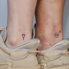 two people with tattoos on their legs and one has a small tattoo on the ankle