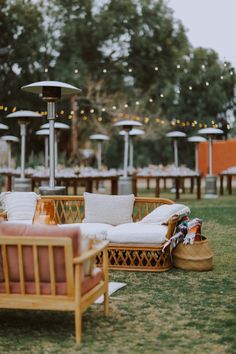 an outdoor seating area is set up with chairs and umbrellas for the guests to enjoy