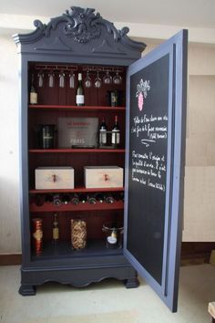 a chalkboard in the corner of a cabinet