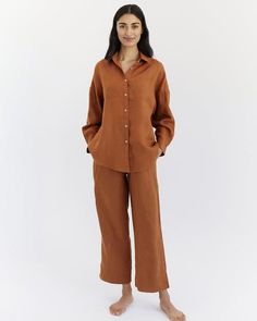 With a classic design and relaxed fit, our 100% Linen Long Sleeve Shirt is a piece for your forever wardrobe. Featuring a button-down front, double pockets at the breast, and a button closure at the wrist, it’s a timeless style that will get you through season after season in ultimate comfort. In winter, pair this everyday essential with matching linen pants for a stylish sleepwear option, or wear it with jeans and loafers to the office. In summer, tuck it into high-waisted shorts, throw it over Pinstripe Bedding, Linen Sleepwear, Linen Weaving, Bed Threads, Linen Robe, Linen Shirts, Women Blouse, Linen Top, Linen Pants