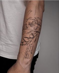 a man with a tattoo on his arm