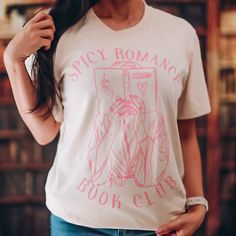 Love a spicy romance book? US TOO! Welcome to the Spicy Romance Book Club🌶 All you need to make it official is this shirt in your closet🖤 Designed by @thebookishshop. Offered in our ultra soft, unisex boyfriend tee's in heather dust with mauve ink. Model is wearing a size Medium. Romance Book Club, Spicy Romance, Ink Model, Boyfriend Tee, Romance Books, Love A, Book Club, Romance, Size Medium