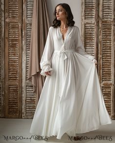 Elegant V-neck Bridal Dress, V-neck Lace Trim Nightgown For Wedding, Elegant V-neck Gown For Wedding Night, Elegant Fitted V-neck Sleepwear, Floor-length Wedding Nightgown With Lace Trim, Floor-length Lace Trim Nightgown For Wedding, Feminine Wedding Dress With Satin Finish, Elegant Long Sleepwear For Evening, White Satin Finish Dress For Wedding Night