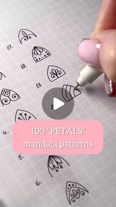 a person is drawing on a piece of paper with the words 100 petal's