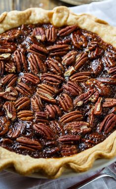 a pecan pie is sitting on a table