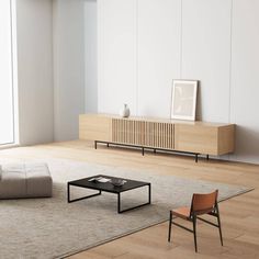 a living room with a couch, chair and coffee table