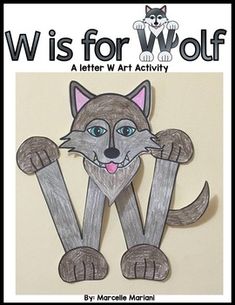 a paper cut out of a cat with the words w is for wolf