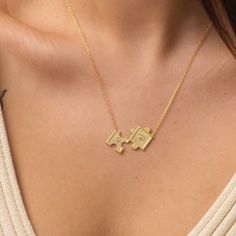 Introducing our Puzzle Personalized Necklace, a unique and meaningful piece that celebrates the beauty of connection. Crafted with care, this necklace features puzzle piece pendants that can be personalized with initials, names, or special dates. Made from high-quality materials, it exudes both durability and style. The adjustable chain ensures a comfortable fit, allowing you to wear it effortlessly. Whether as a heartfelt gift for loved ones or a symbol of unity for yourself, the Puzzle Personalized Necklace is a beautiful reminder of the special bonds we share. Embrace the power of connection with this captivating piece, designed to be cherished for a lifetime. 💎 All our dainty jewelry are handmade with love! ➜ Material: REAL 925 STERLING SILVER ➜ Finish: STERLING SILVER * 18K GOLD * RO Puzzle Necklace, Personalized Gold Necklace, Puzzle Piece, Heartfelt Gifts, Dainty Jewelry, Personalized Necklace, Necklace Handmade, Necklace Gift, Name Necklace